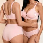 Two models wearing the Wave Wireless Bra in Blush, front and back